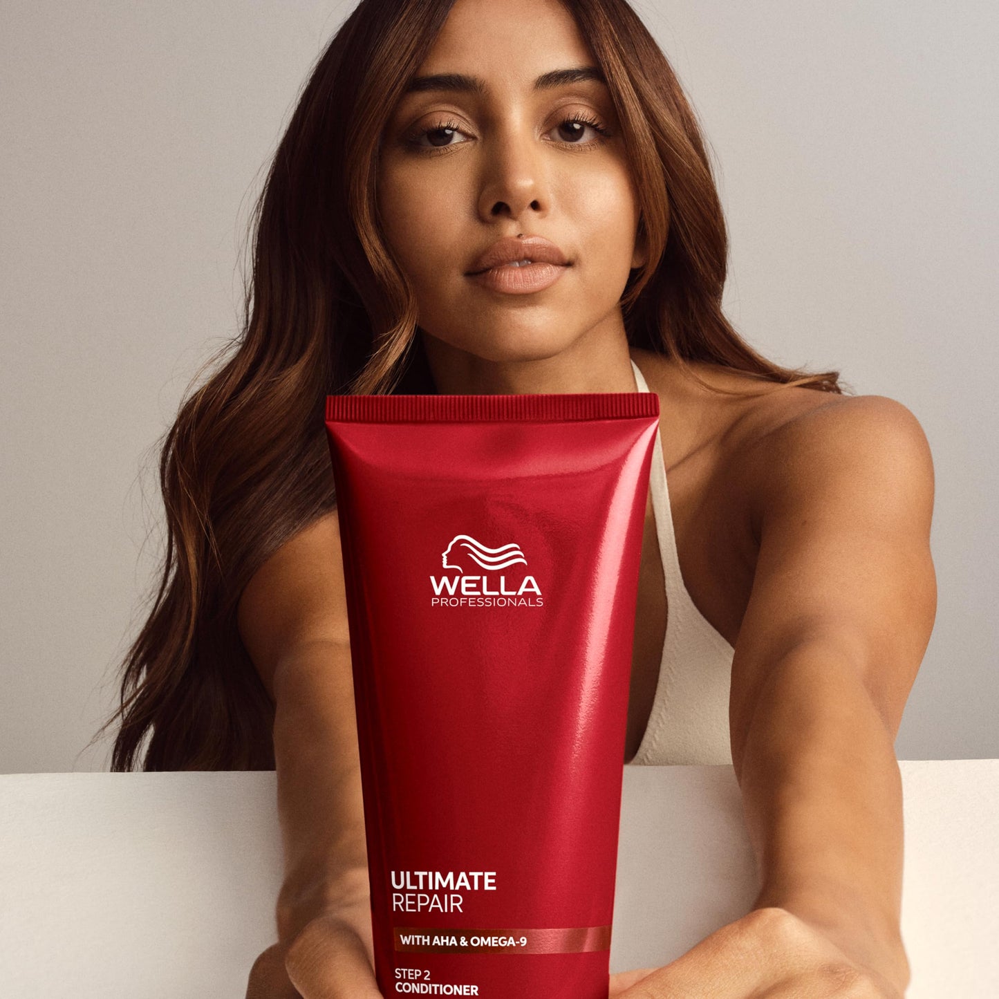 Dark Gray Wella Professionals ULTIMATE REPAIR Conditioner for Damaged Hair | Deeply Nourishing | Replenishes & Repairs | 6.7 Fl Oz - Packaging May Vary