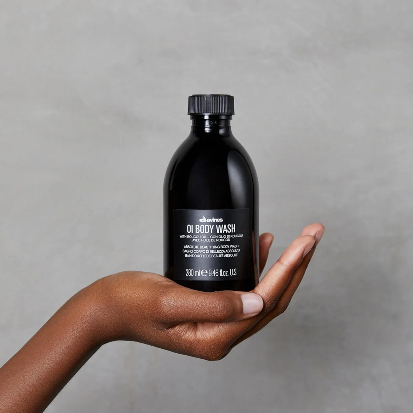 Dark Gray Davines OI Body Wash, Gently Cleansing Moisturizing Body Wash for All Skin Types - Hydrates & Softens Skin with Antioxidant Roucou Oil - Rich Creamy Foam with Signature OI Scent, 9.47 Fl Oz