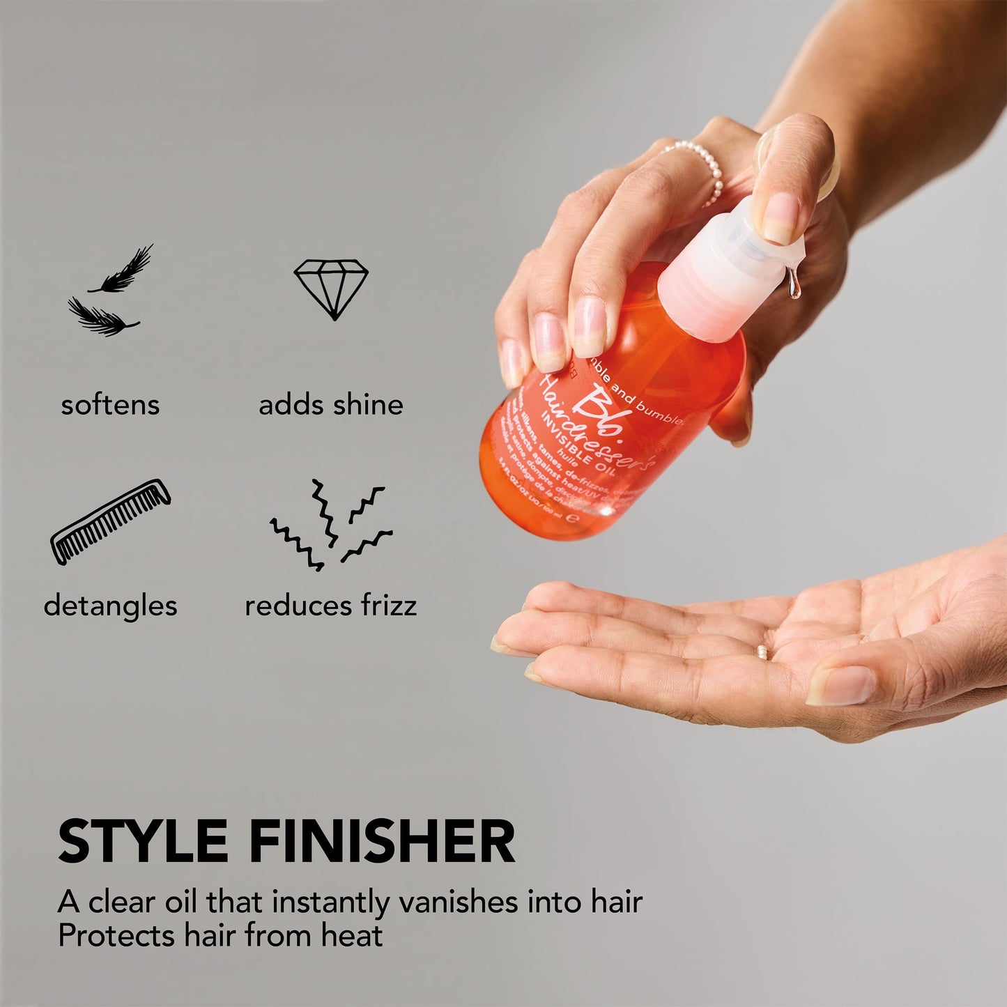 Dark Gray Bumble and bumble. Hairdresser's Invisible Oil Frizz-Reducing Hair Oil | Heat Protection, Frizz Control + Shine | Curly, Wavy, Straight | With Grapeseed, Coconut + Argan Oils, 3.4 Fl Oz