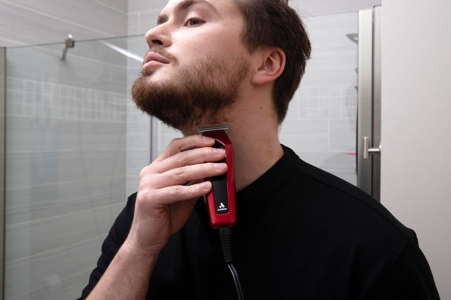 Black Andis 562940 Ultra Clip Corded Clipper & Trimmer 15-PieceHair Cutting Combo Kit, Stainless Steel Blades, Power Pivot Motor, Whisper Quiet, Hanger Loop, Red