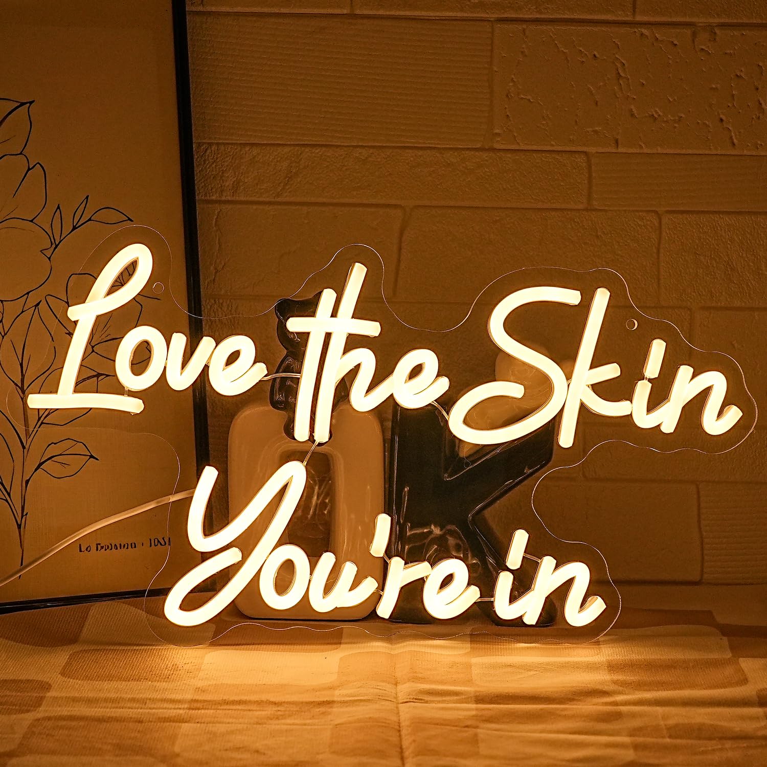 Saddle Brown Gyaksjm ''Love the Skin You're in'' Neon Sign Facial Spa Neon Light for Wall Decor Warm White Letters Neon Lights Beauty Salon Sign for Business Skin Care Salon Beauty Shop Decorations