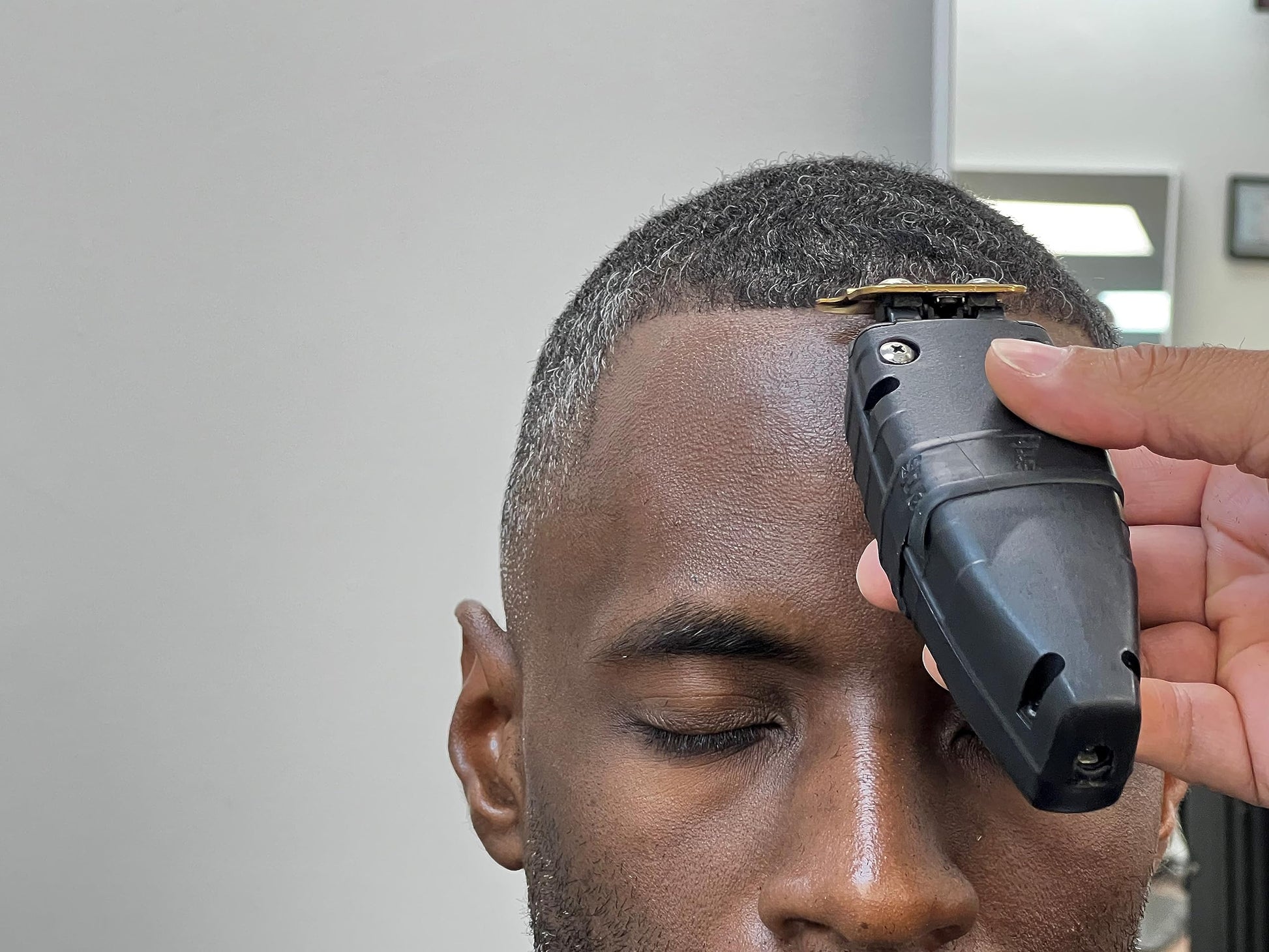Gray Andis 74150 GTX-EXO Professional Cord/Cordless Lithium-ion Electric Beard & Hair Trimmer with Charging Stand, Black